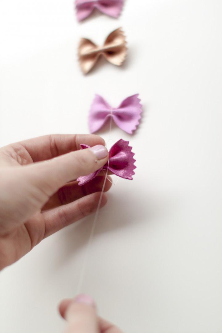 diy bow noodle photo backdrop