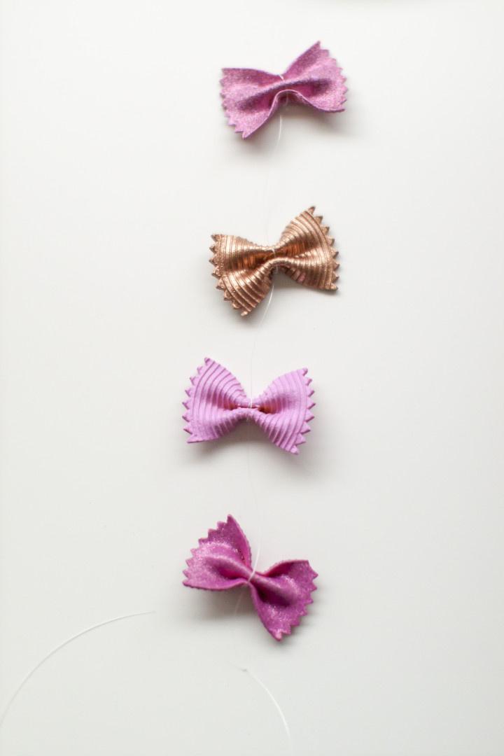 diy bow noodle photo backdrop