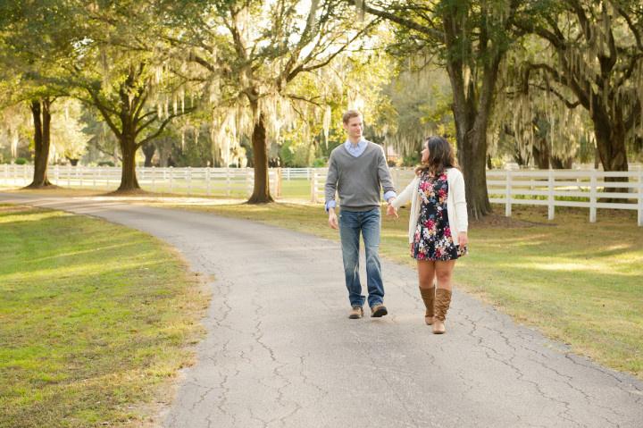 engaged couple walking