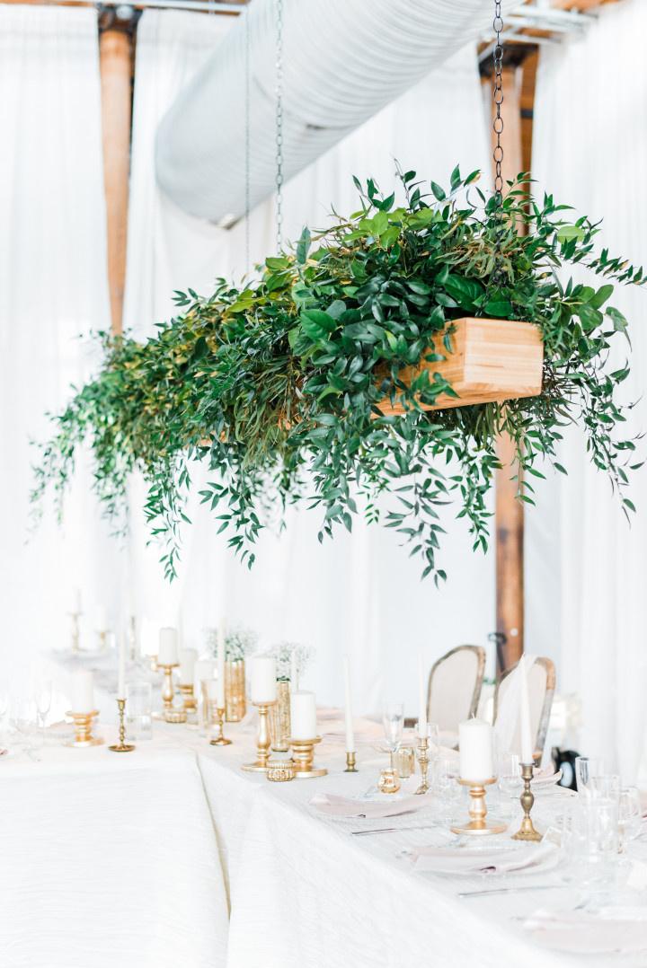 50 Unexpected Ways to Decorate with Greenery  Wedding decor inspiration,  Hanging centerpiece, Wedding table centerpieces