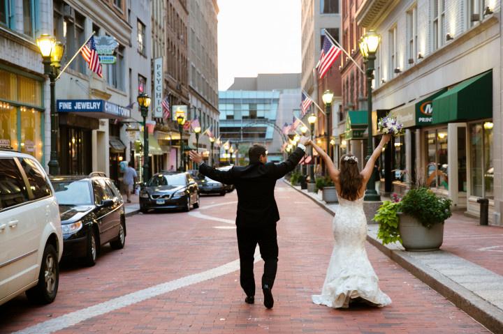 couple walking down hartford street
