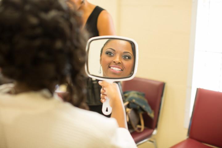 bride looking in mirror