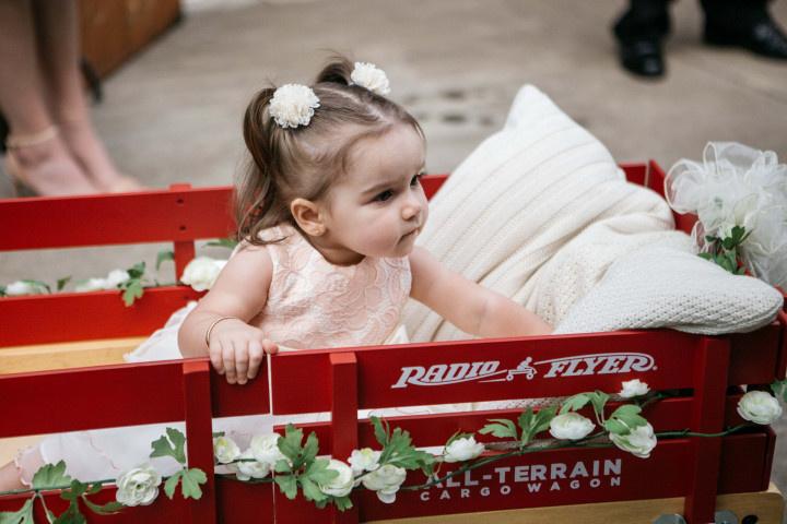 flower girl in wagon