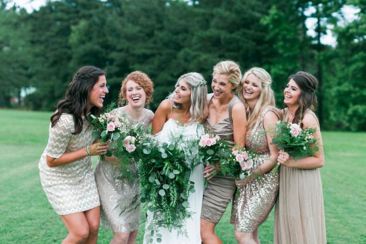 boho bride with bridesmaids wearing short gold dresses