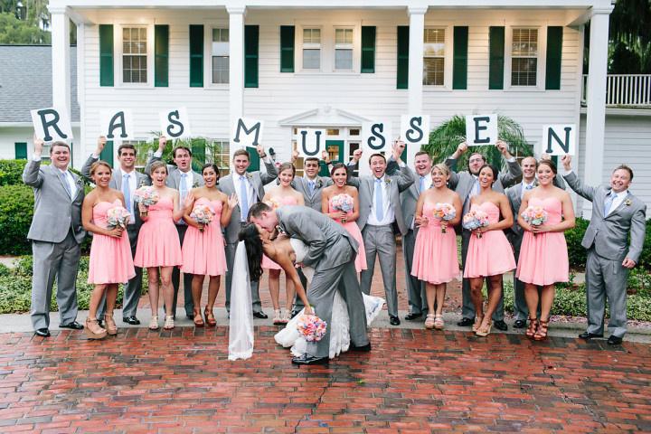 wedding party holding signs