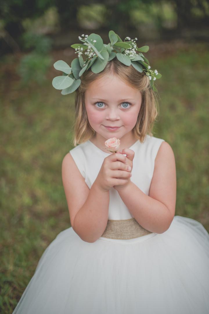 flower girl with greenery crown
