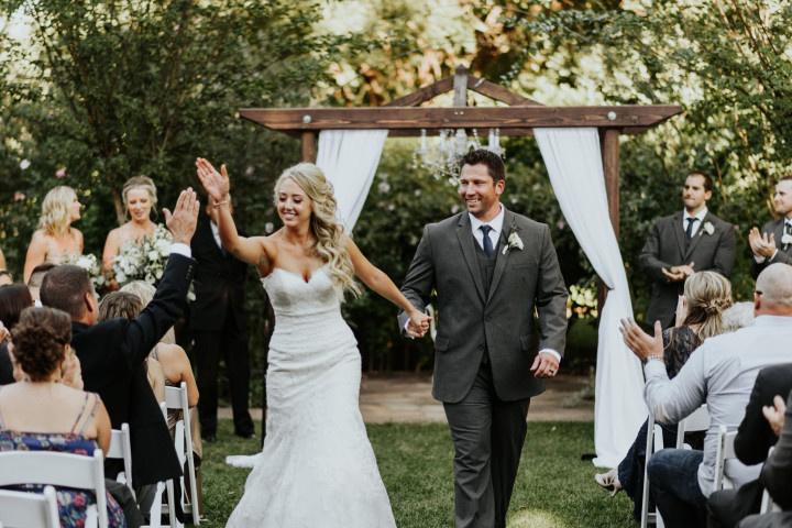 couple recessional high five 