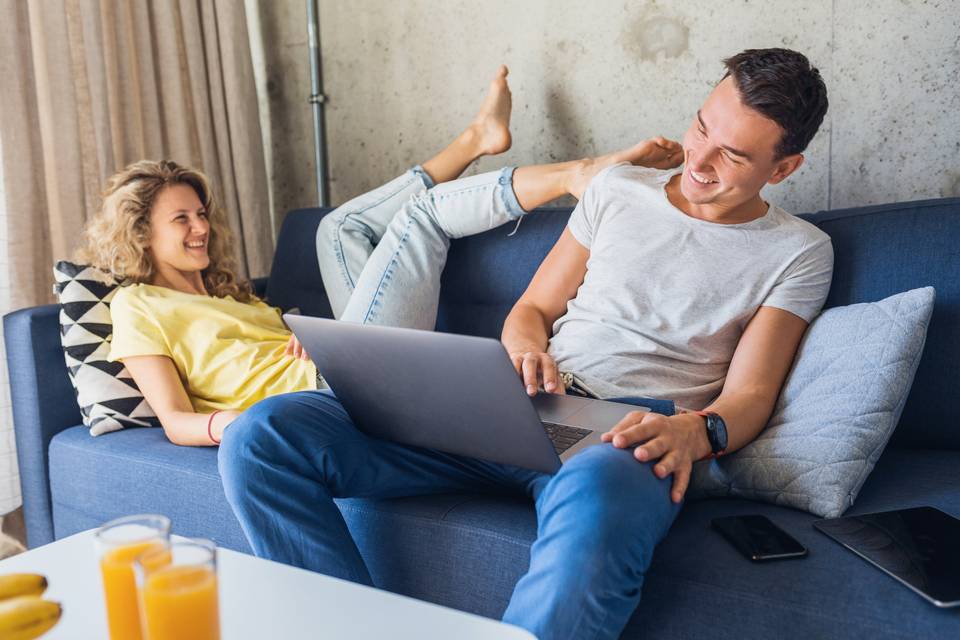 couple being silly on the couch