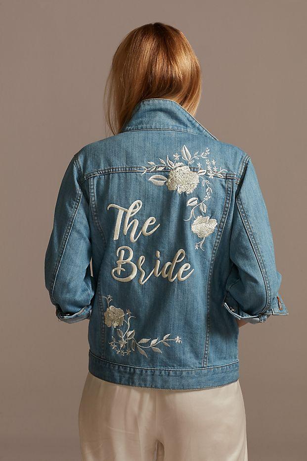 Denim jacket embroidered in white with flowers and The Bride