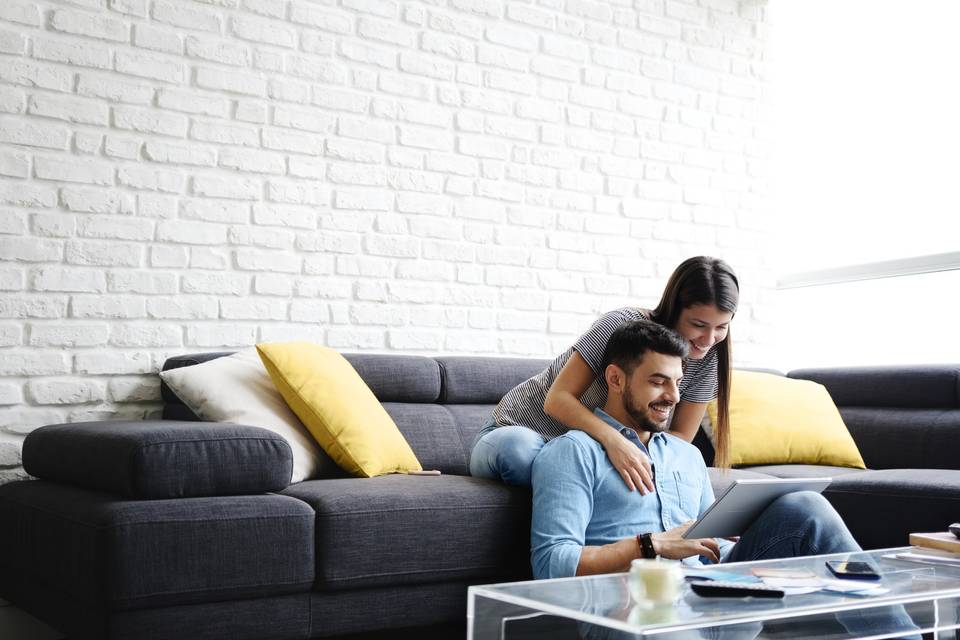 couple looking at ipad