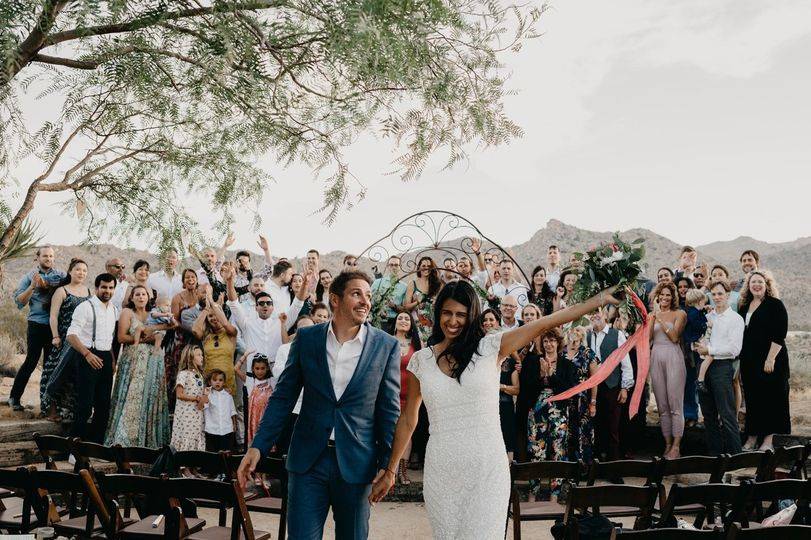 couple recessional at outdoor wedding