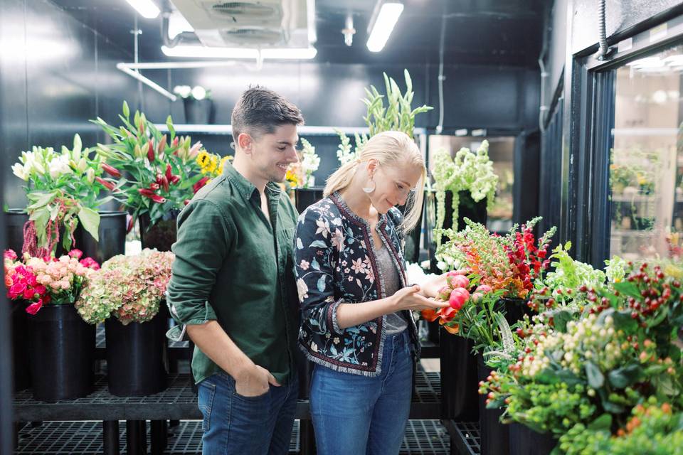 couple looking for flowers