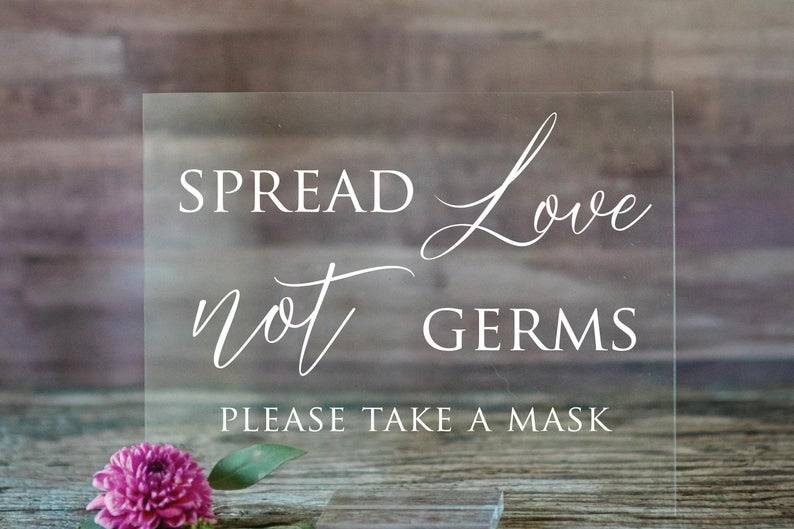 spread love not germs sign