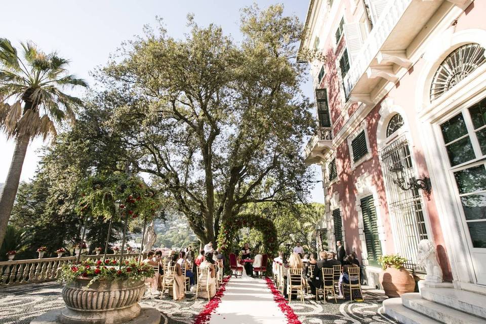 outdoor wedding ceremony at historic italy wedding venue estate