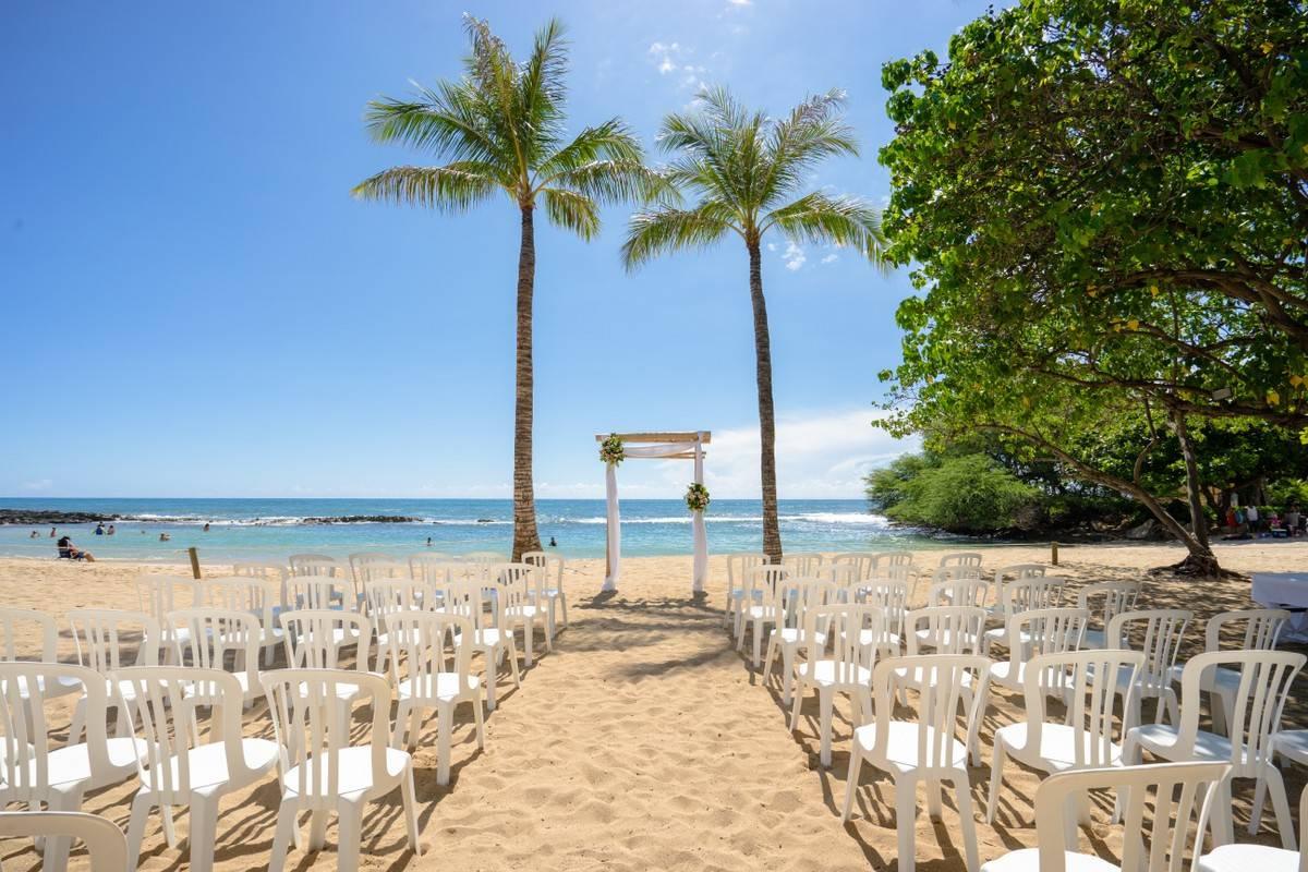beach wedding ceremony looking at the ocean