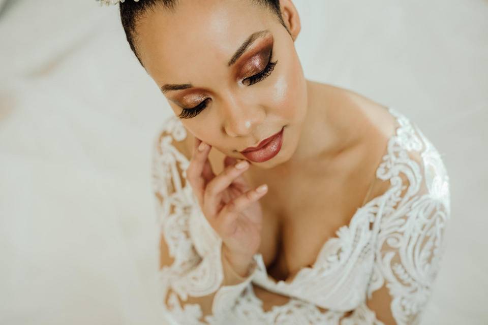 beautiful bride showing off makeup