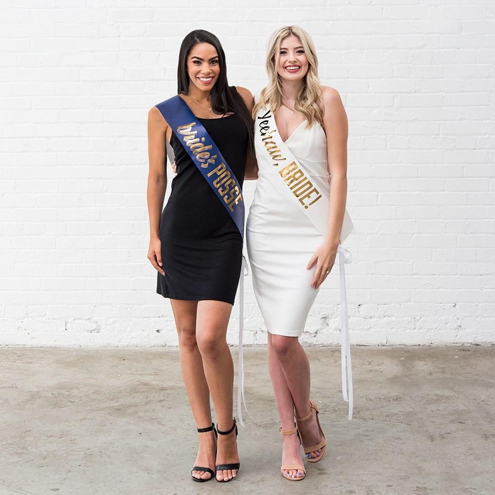 Bride and bridesmaid wearing country-themed sashes