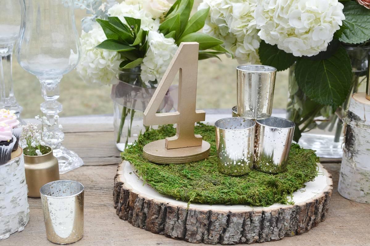 Centerpieces with Candles on Wood Slabs