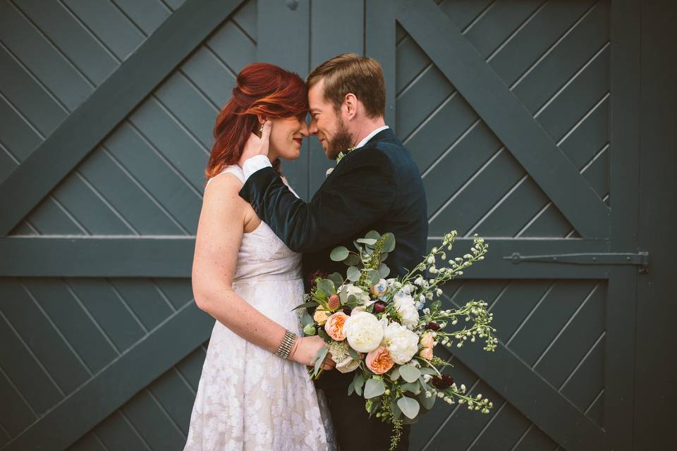 Bride and groom posing for portrait on wedding day