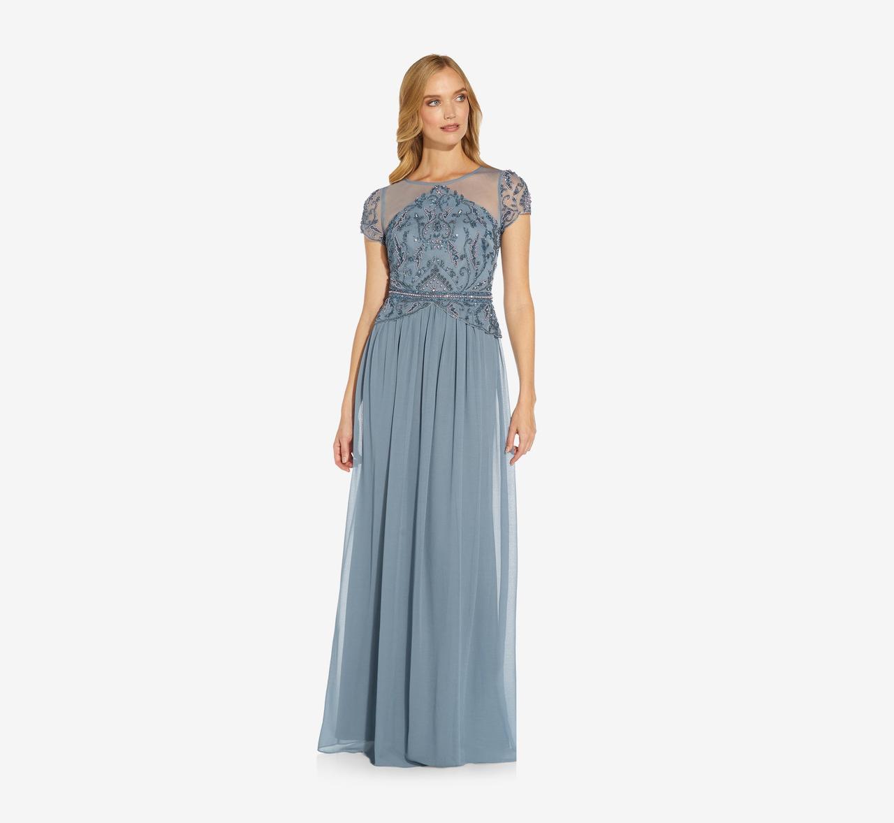 Blue chiffon gown with beaded bodice and flutter sleeves