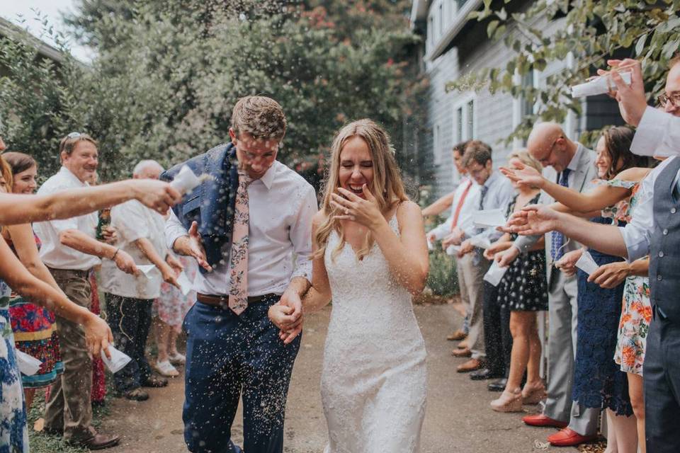 couple confetti backyard wedding