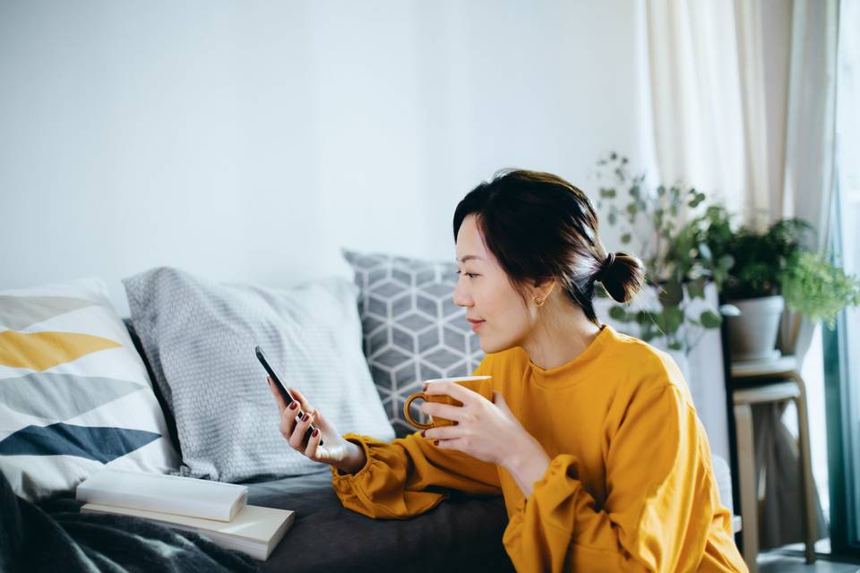 woman looking at phone