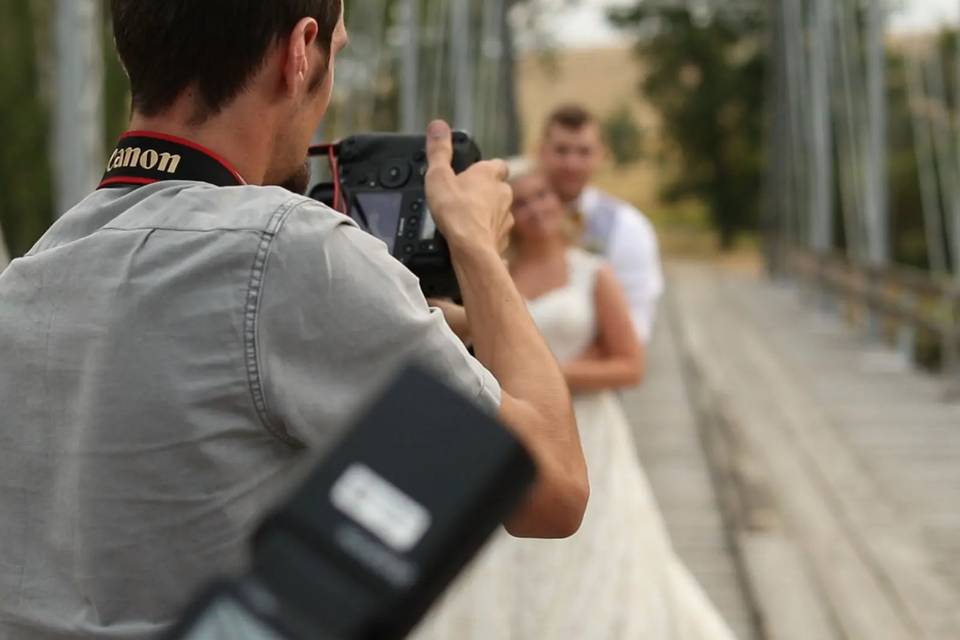 wedding videographer capturing bride and groom