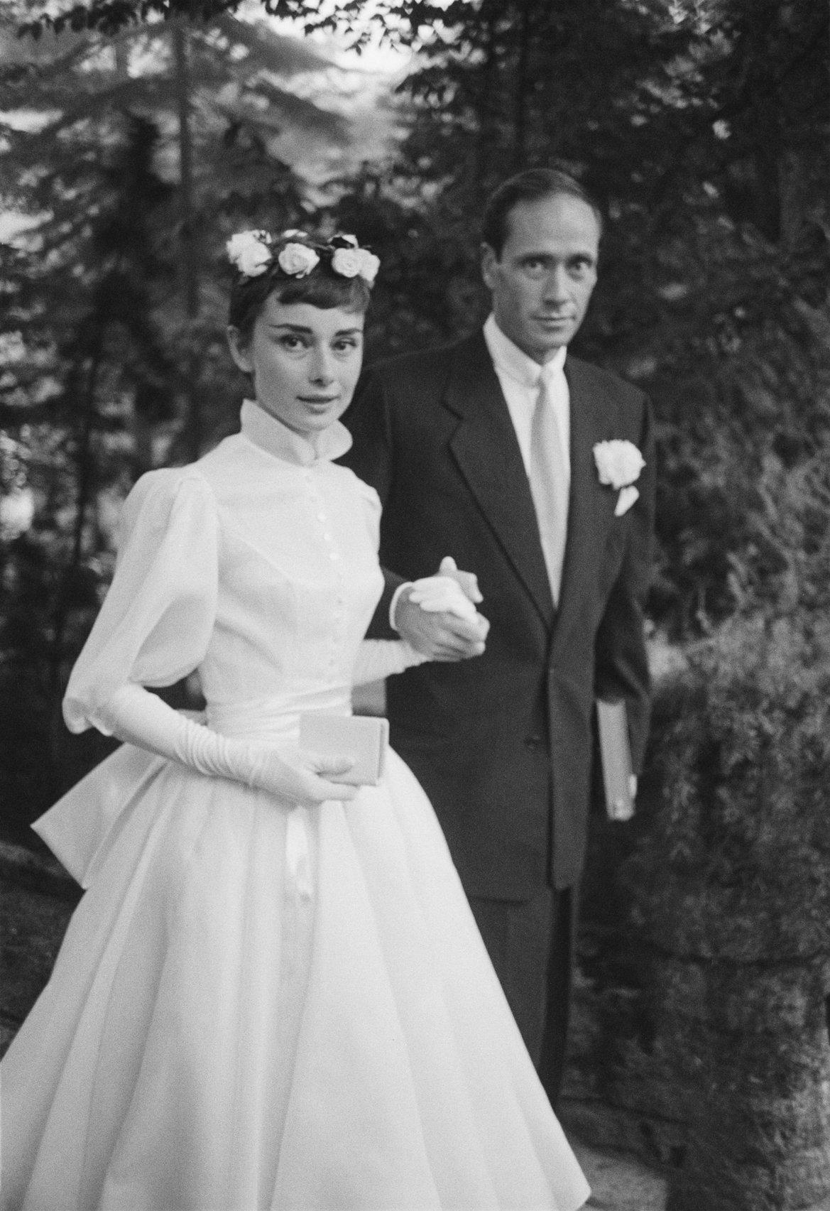My grandmother modeling a Christian Dior wedding gown in the