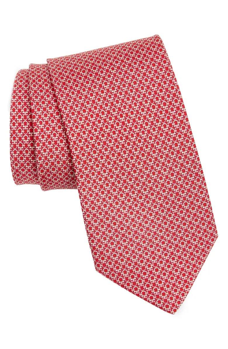 red tie with circular lock pattern