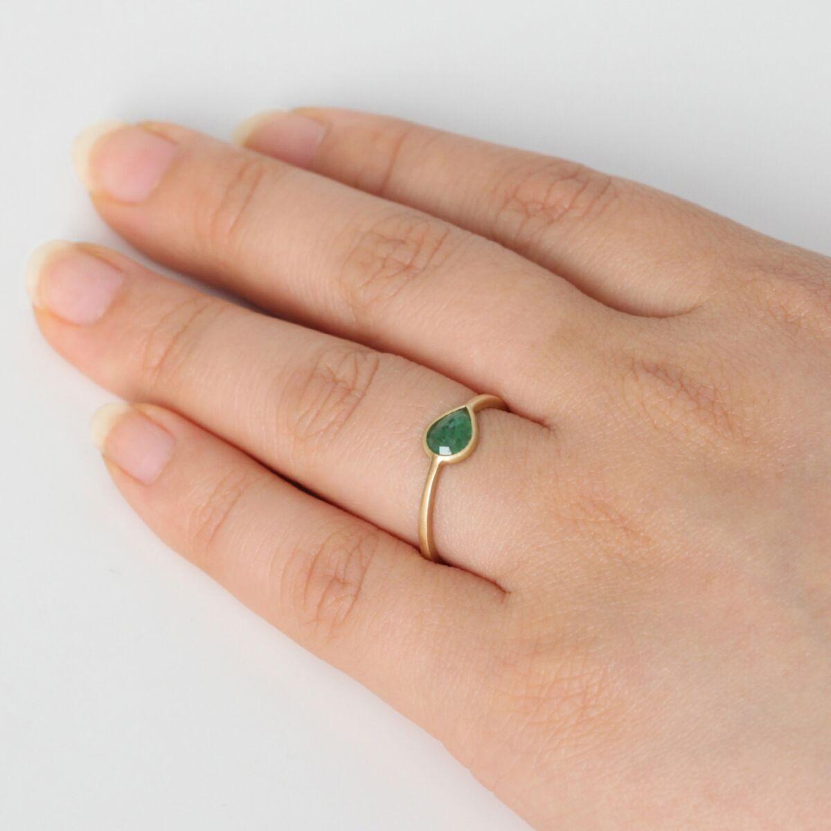 Minimalist rose-cut emerald engagement ring with yellow gold band