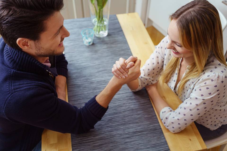 couple arm wrestling