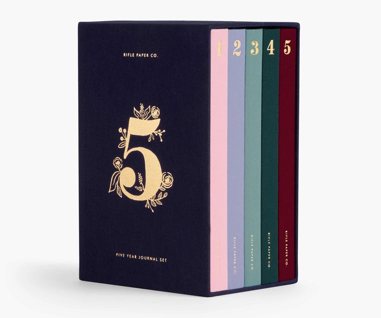 Hardcover five year journal set in different colors with corresponding number on front in gold