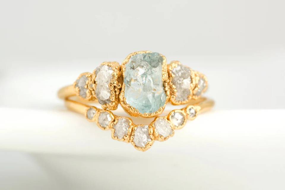 yellow gold cluster engagement ring with rough diamonds and aquamarine
