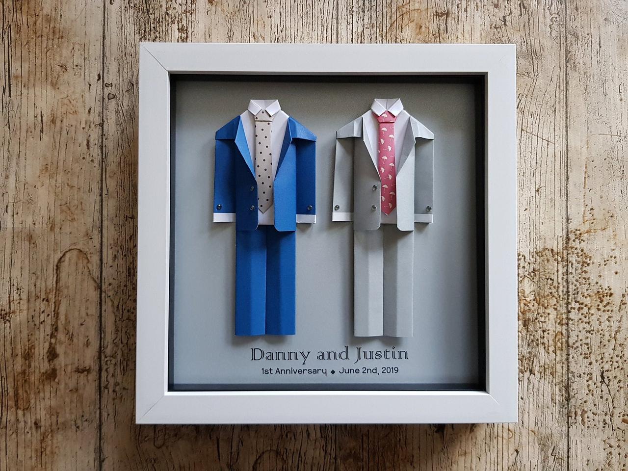 Origami wedding art showing both grooms