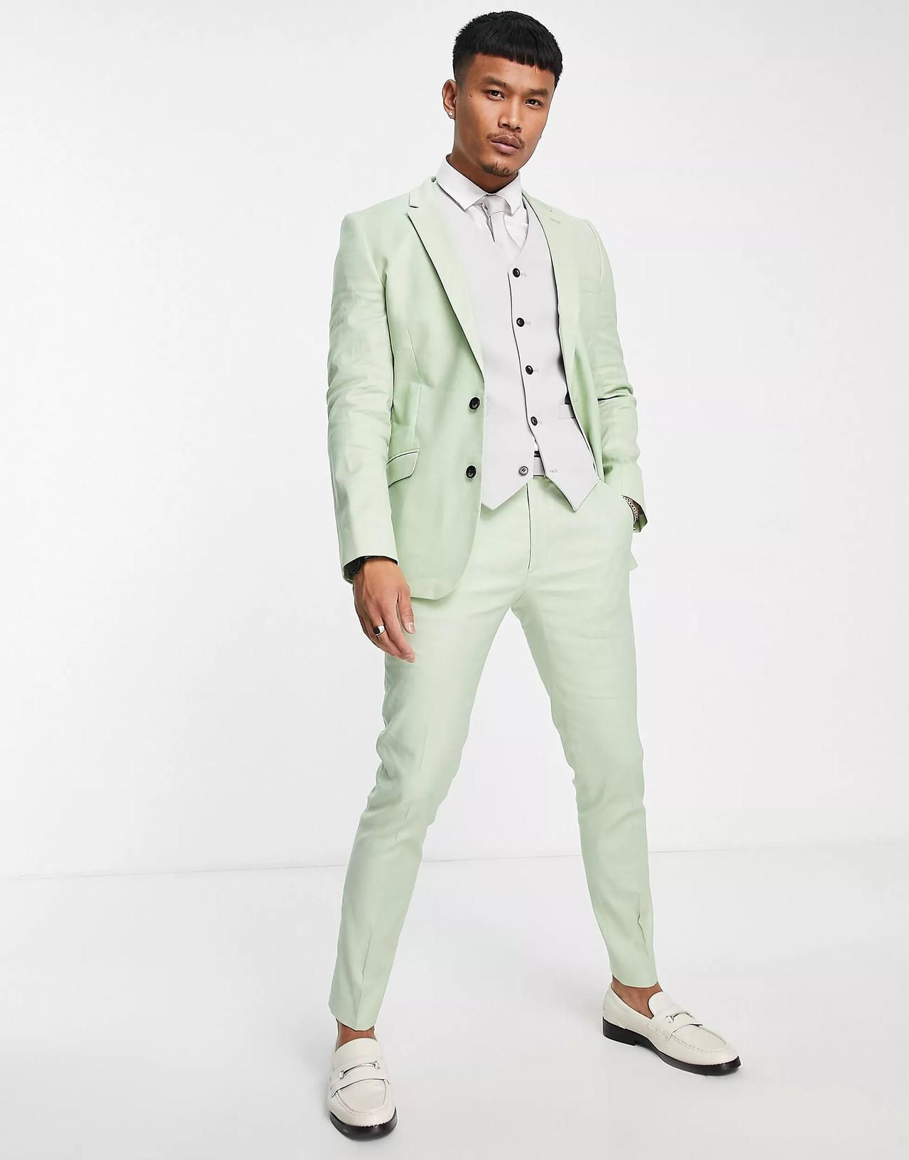 Light green three-piece formal suit for wedding rehearsal guest