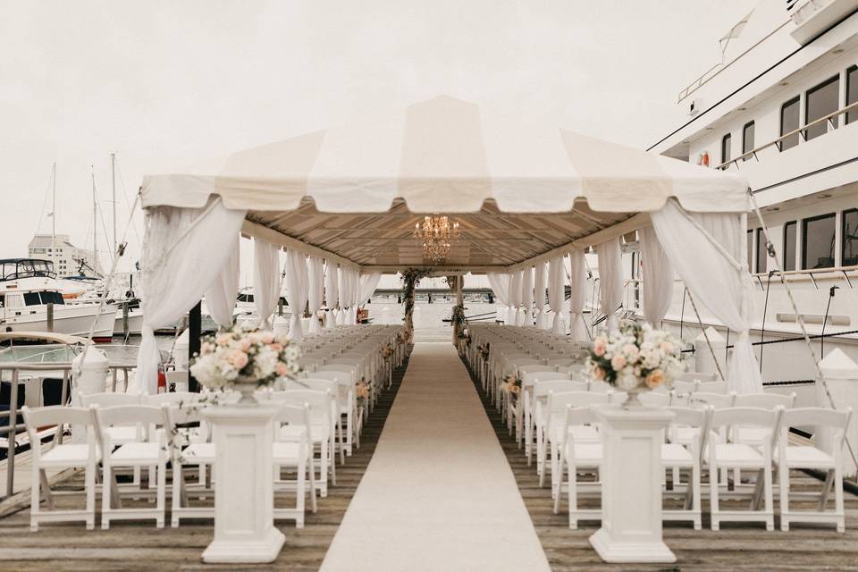 waterfront ceremony at rhode island wedding venue on a dock at yacht marina