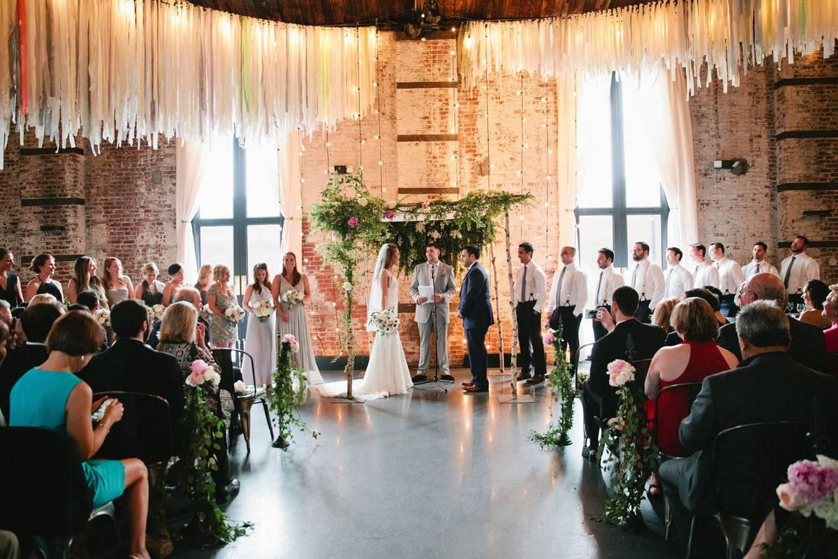indoor wedding ceremony in industrial space