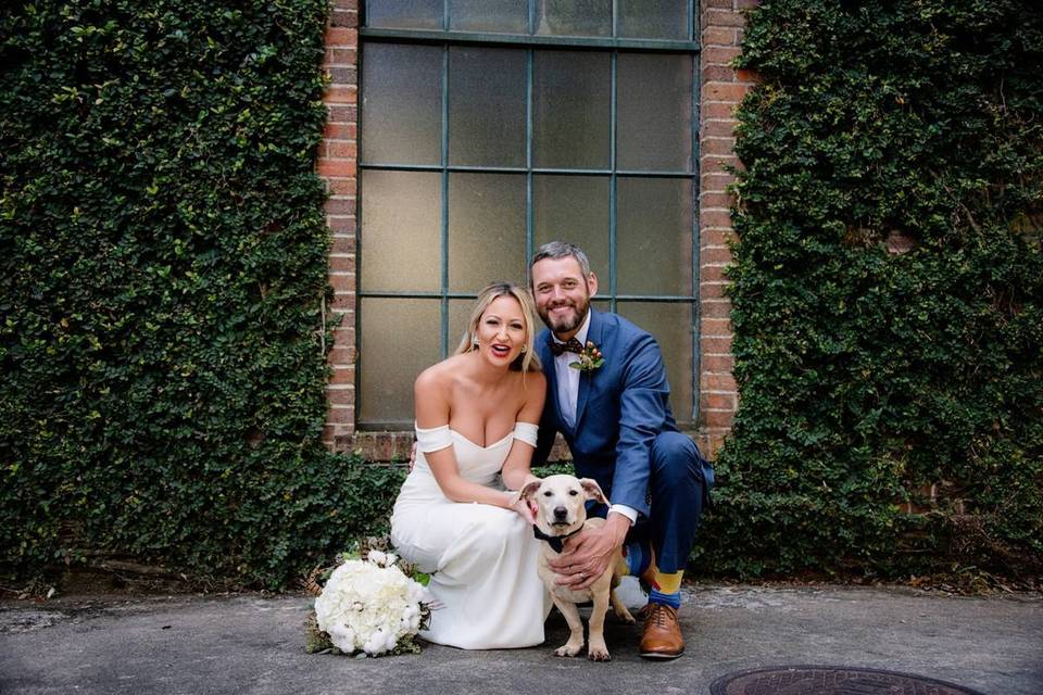 bride and groom with dog