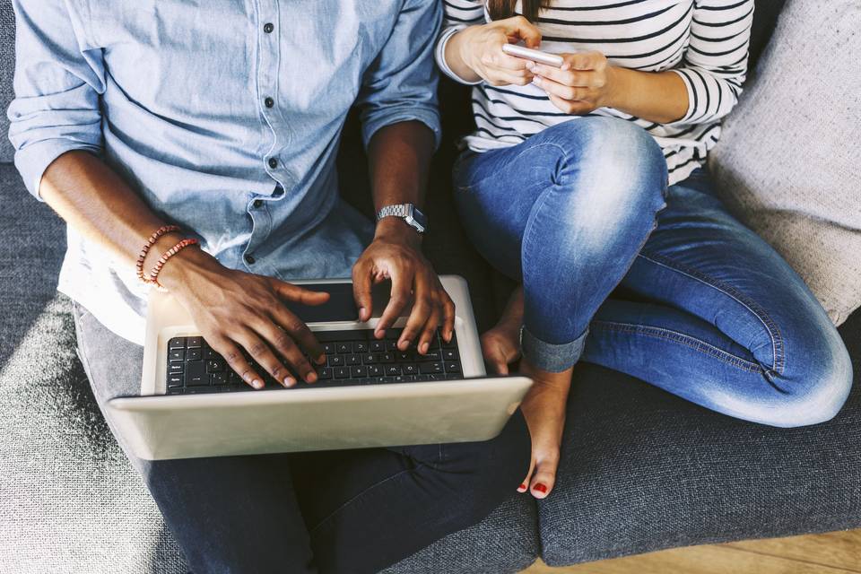 couple on computer and phone