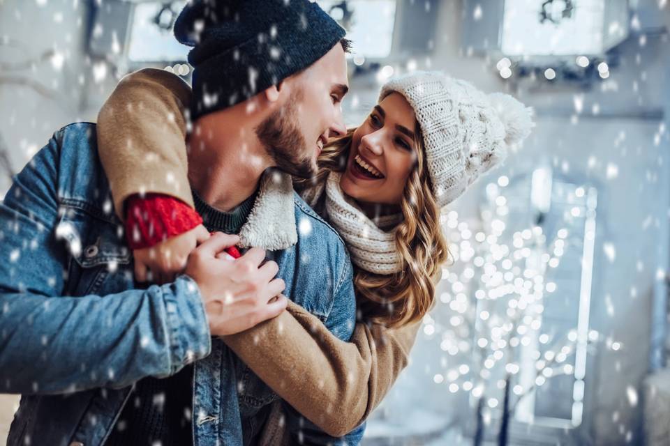 couple hugging in snow