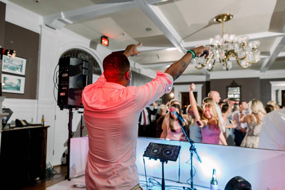 wedding dj performing at reception