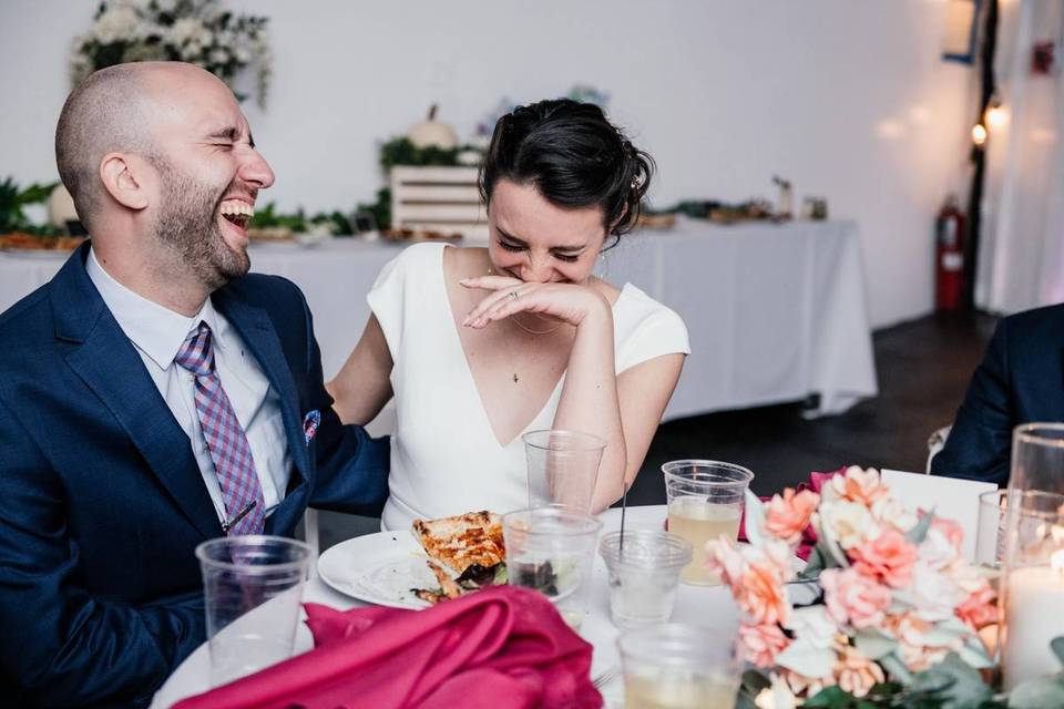 laughing wedding couple