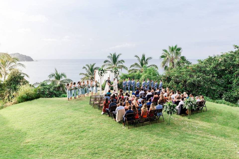 outdoor destination wedding ceremony overlooking ocean