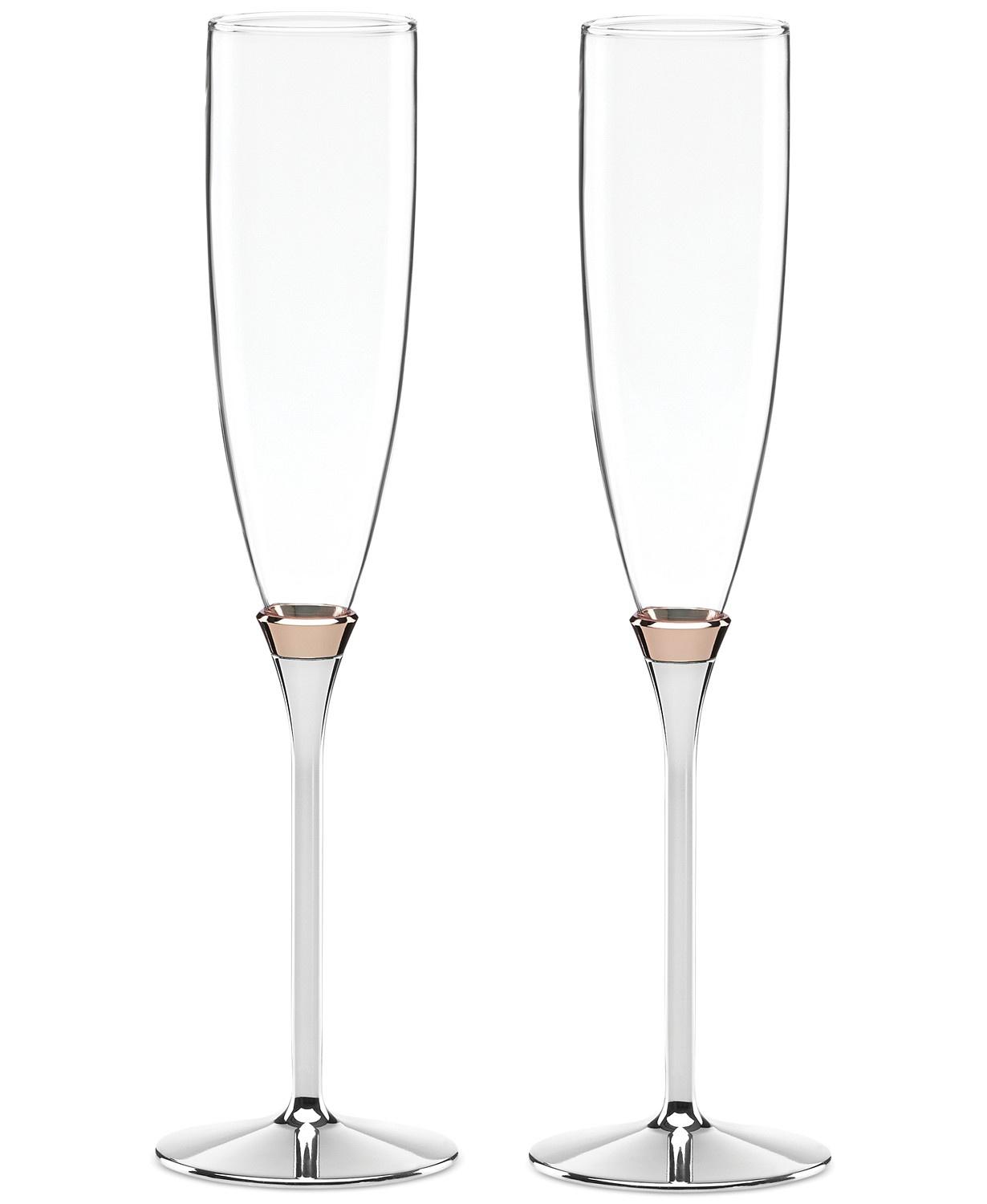 Silver-stemmed wedding champagne flutes with rose gold detail