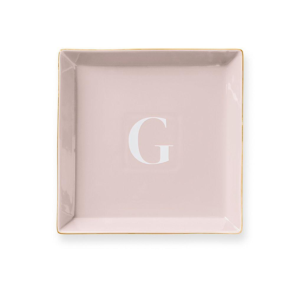 light pink ceramic catchall tray with G monogram