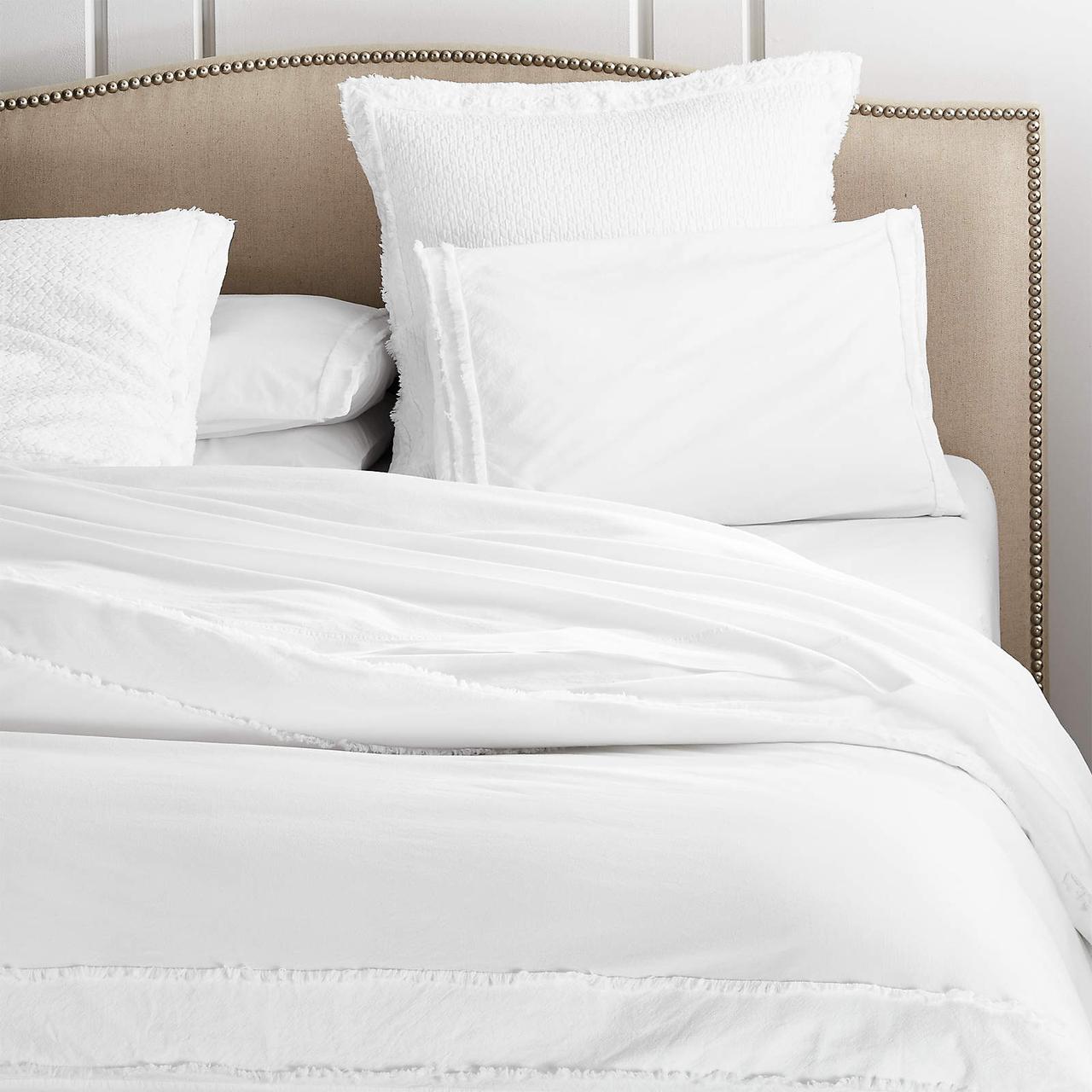 white organic cotton duvet on bed