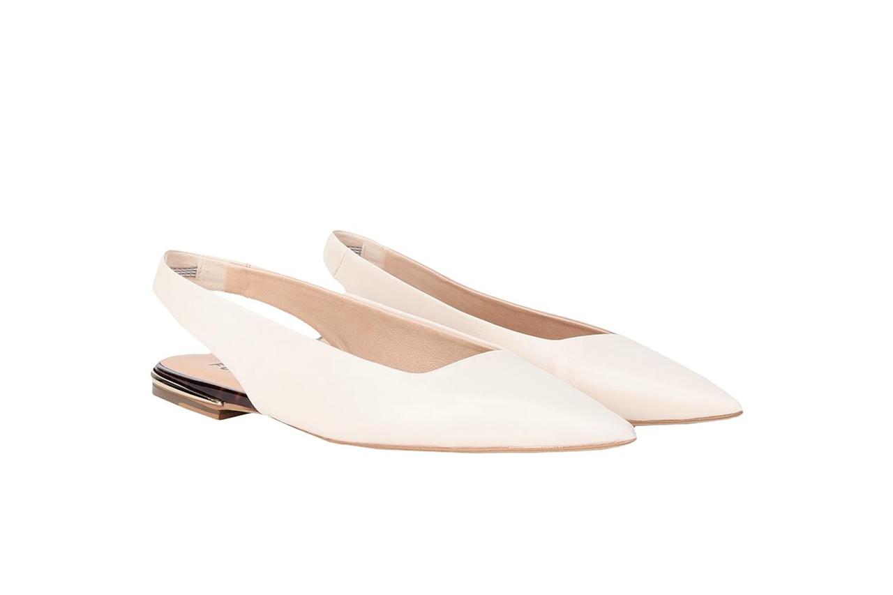 Ivory slingback ballet flats with cutouts on back
