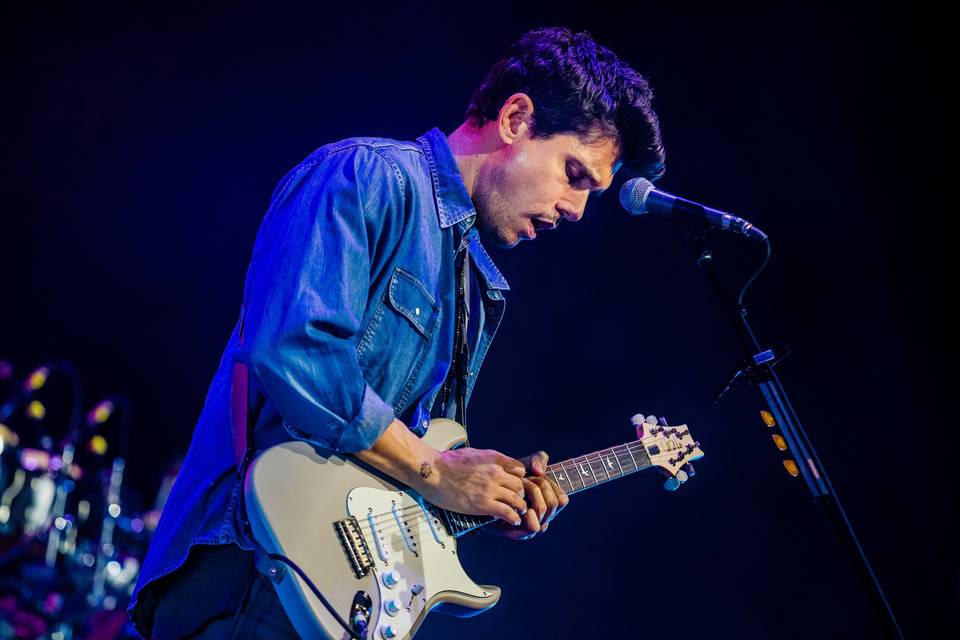 john mayer playing PRS silver sky guitar on stage during 2019 world tour