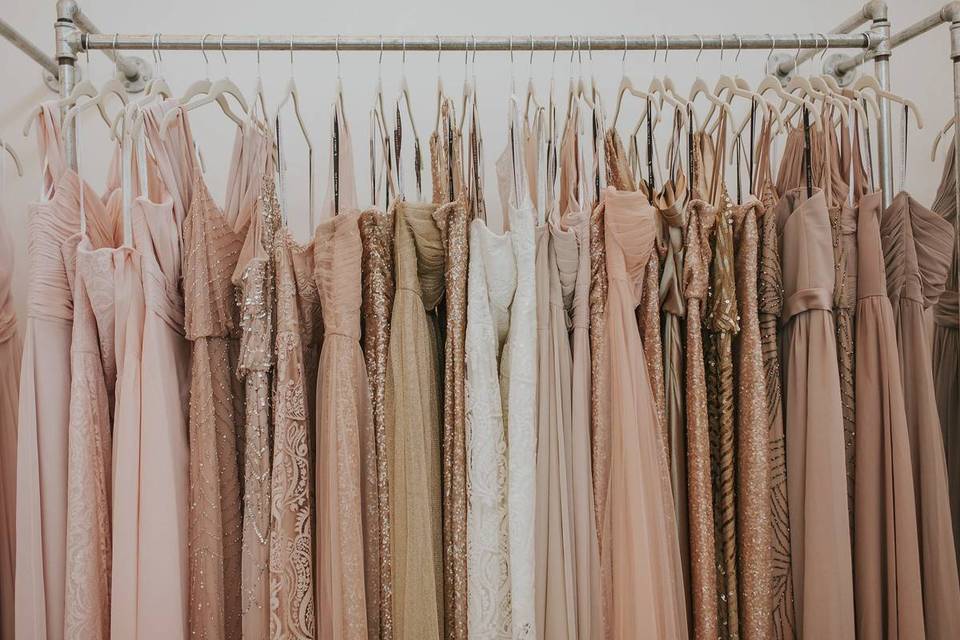 bridesmaid dresses on a rack