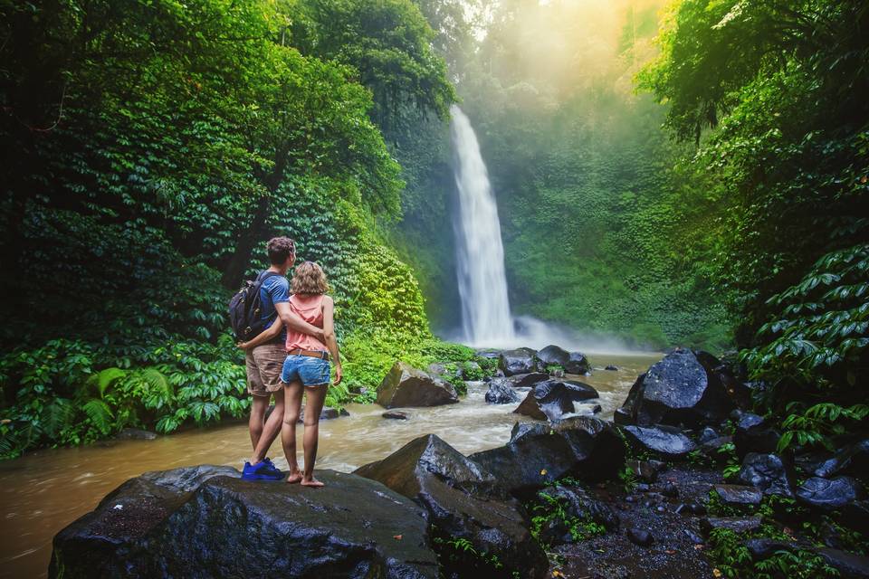 couple looking at a waterfall